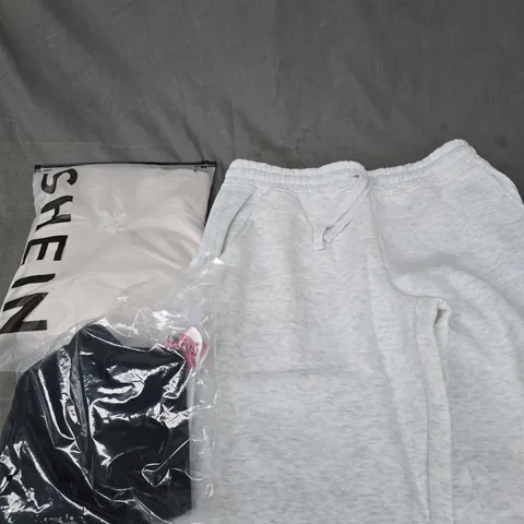 APPROXIMATELY 20 ASSORTED CLOTHING PRODUCTS IN VARIOUS STYLES & SIZES TO INCLUDE JACKETS, T-SHIRTS, DRESSES ETC