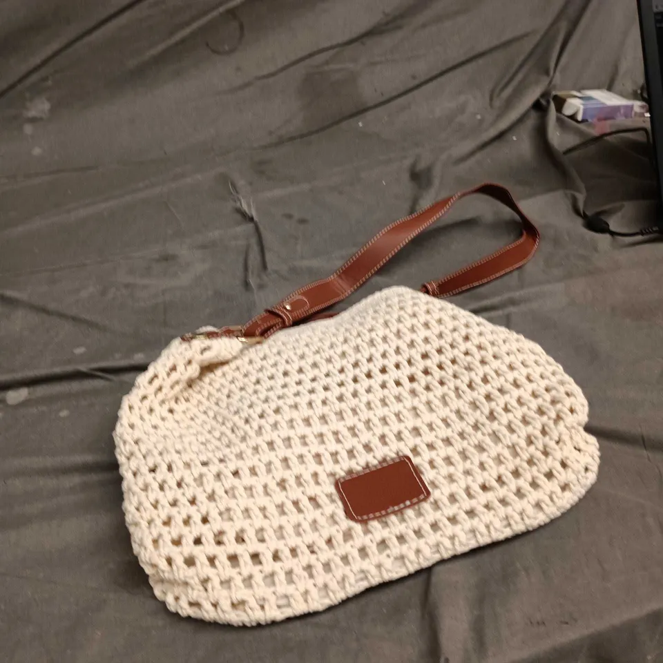 Beige crochet handbag with brown leather strap 