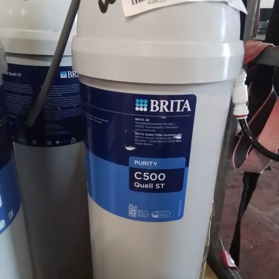 CAGE CONTAINING 12 BRITA PURITY C500 QUELL ST FILTER CARTRIDGE – 960L