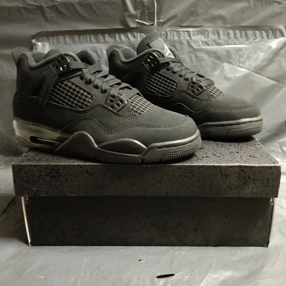 BOXED PAIR OF NIKE AIR JORDAN 4 RETRO SHOES IN BLACK SIZE UK 5