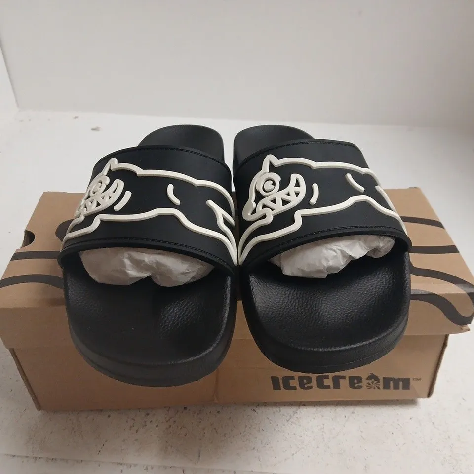 BOXED PAIR OF ICECREAM RUNNING DOG SLIDERS – BLACK, UK 9