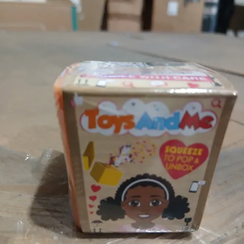 APPROXIMATELY 27 TOYS AND ME COLLECTIBLE TOY IN BOX