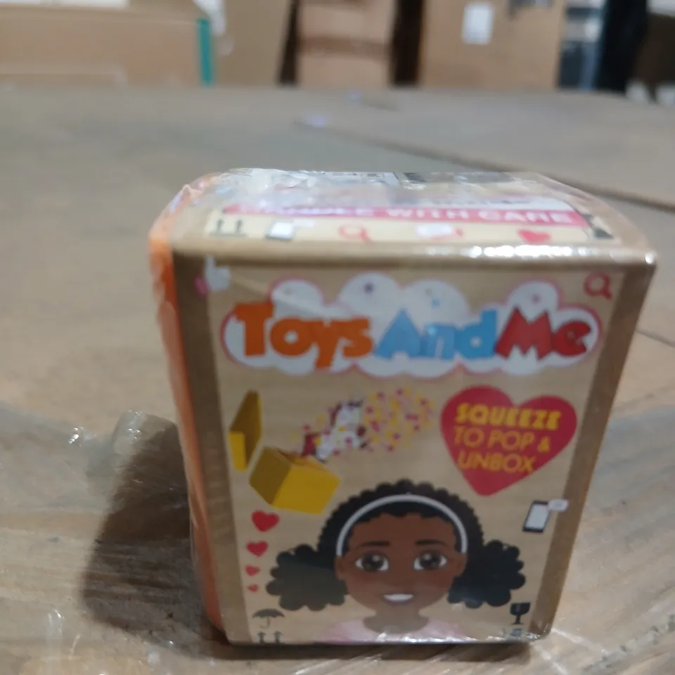 APPROXIMATELY 27 TOYS AND ME COLLECTIBLE TOY IN BOX