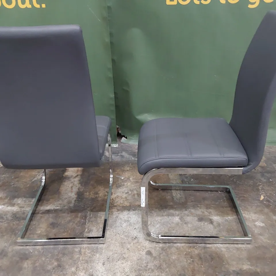 PAIR UPHOLSTERED DINING CHAIRS CHARCOAL PU ON CHROME FRAMES 