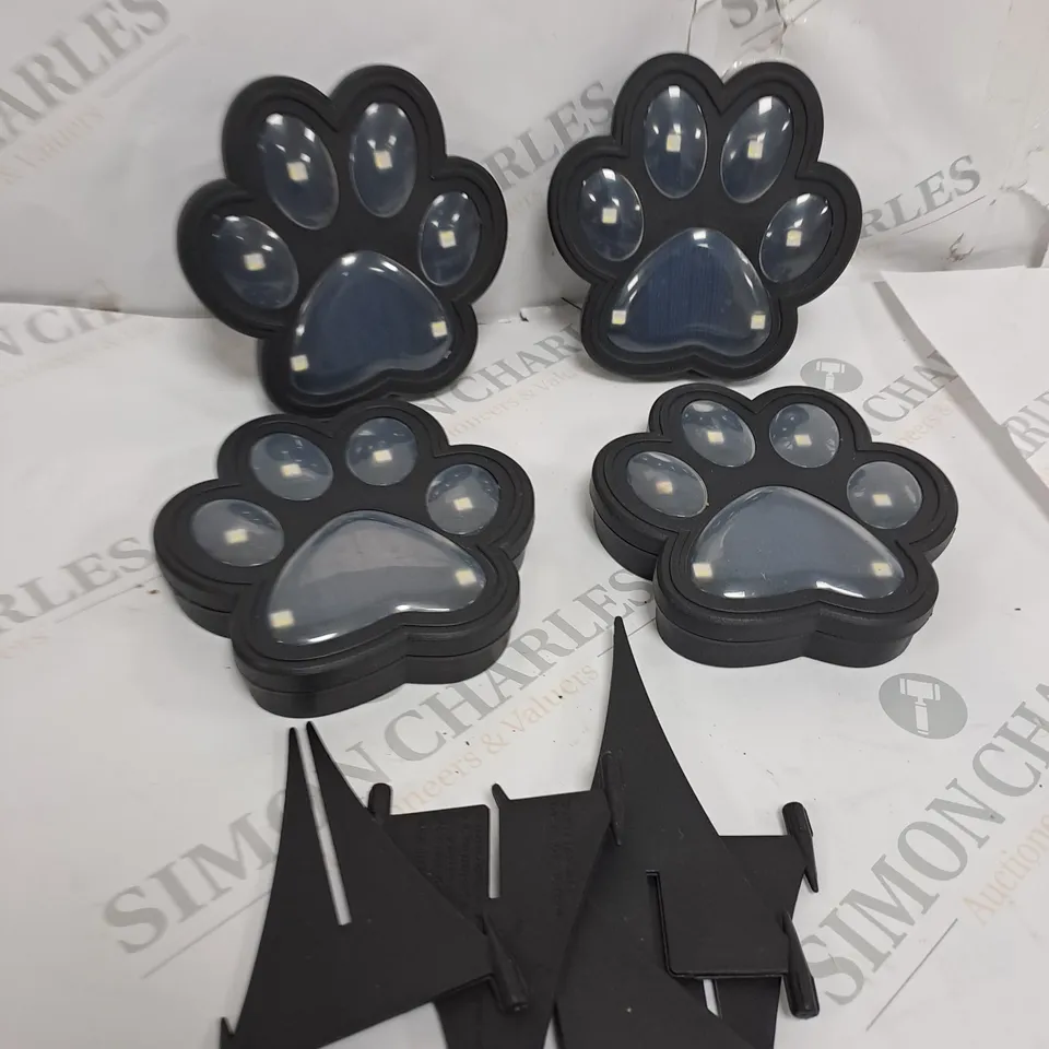 BELL AND HOWELL SET OF 4 SOLAR PAW LIGHTS