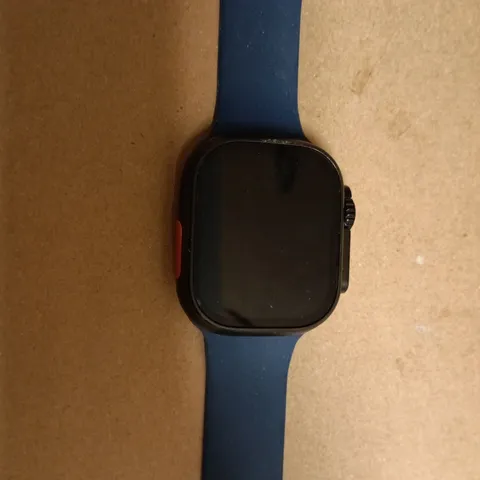 APPLE WATCH ULTRA WITH BLUE SILICONE STRAP