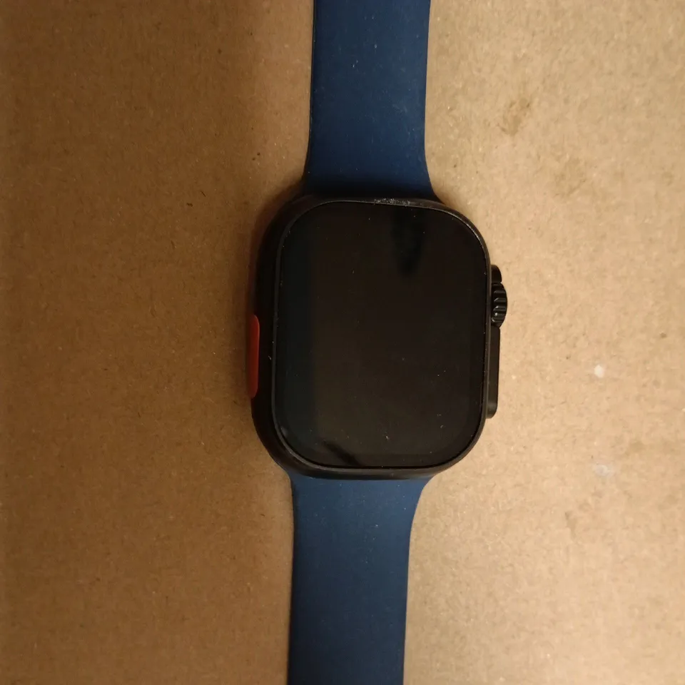 APPLE WATCH ULTRA WITH BLUE SILICONE STRAP