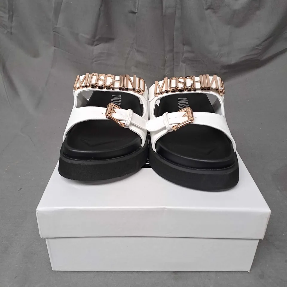 BOXED PAIR OF MOSCHINO SLIDERS SIZE EU 36