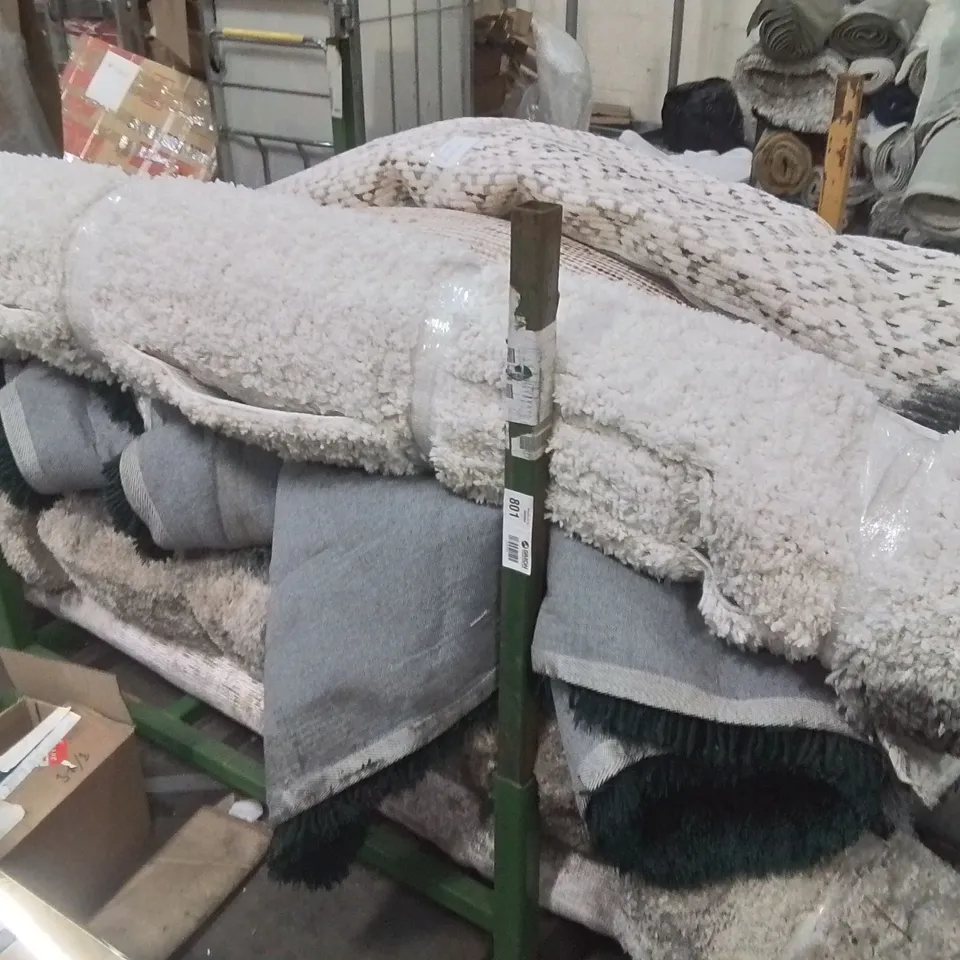 STILLAGE OF APPROXIMATELY 15 QUALITY DESIGNER RUGS