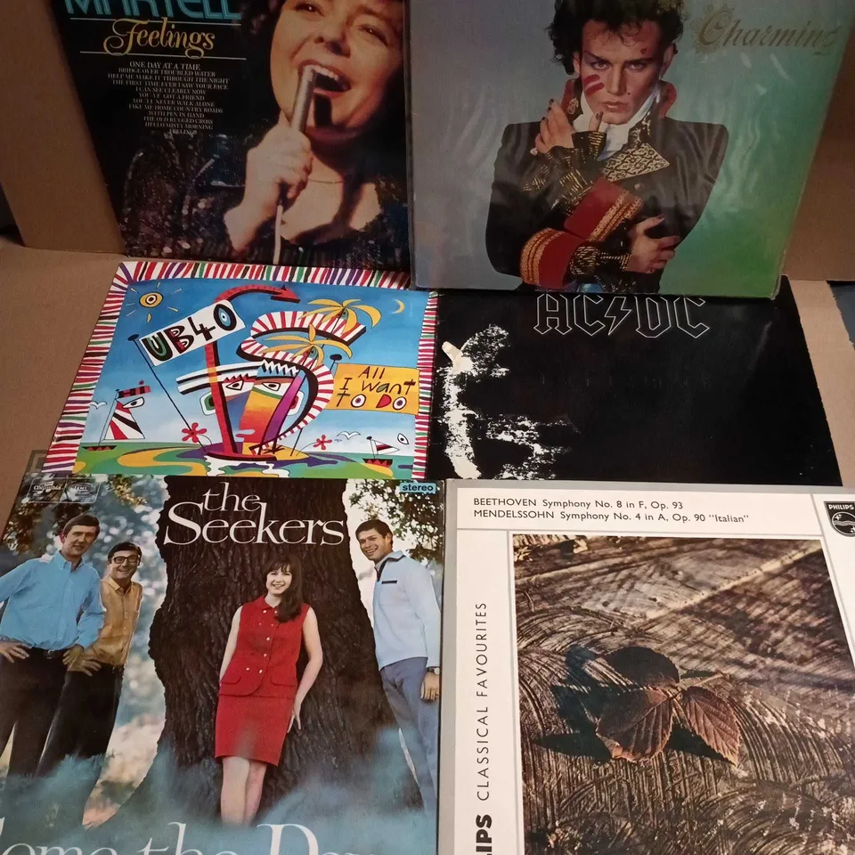 APPROXIMATELY 20 ASSORTED VINYL'S TO INCLUDE ARTISTS SUCH AS ACDC, UB40, ADAM AND THE ANTS, ETC - COLLECTION ONLY