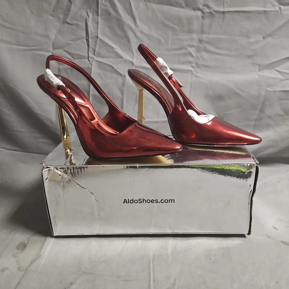 BOXED PAIR OF ALDO POINTED TOE HEELS IN METALLIC RED/GOLD SIZE UK 2