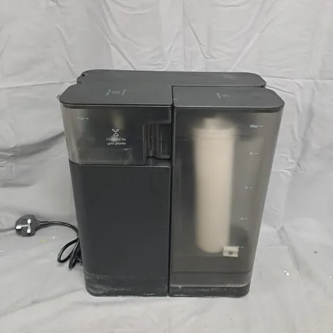 COUNTERTOP APPLIANCE WITH WATER RESERVOIR - MODEL UNSPECIFIED