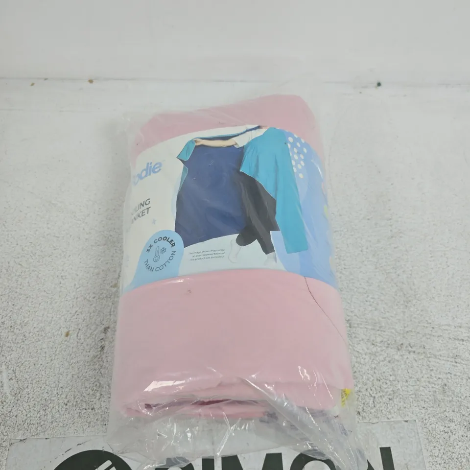 THE OODIE PINK COOLING BLANKET IN PLASTIC PACKAGING
