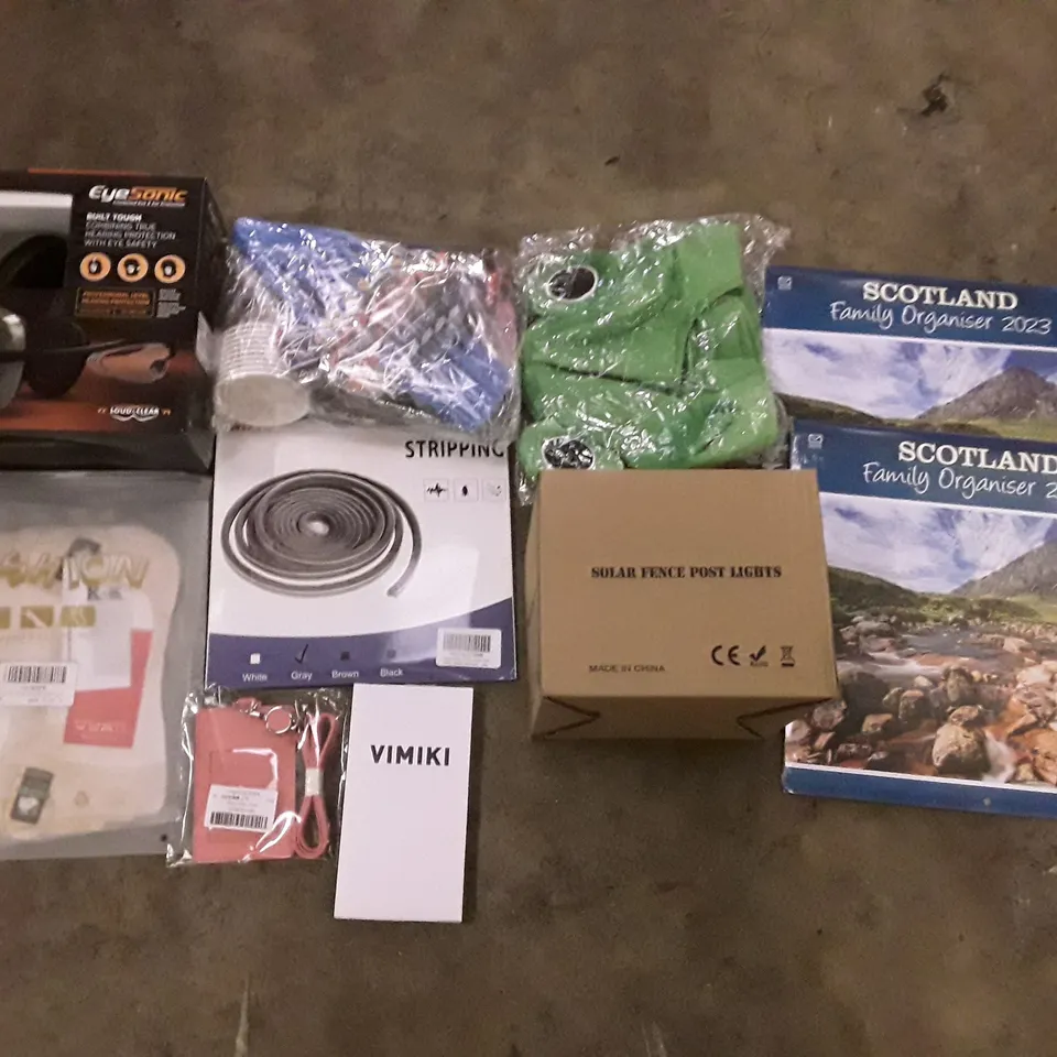 PALLET OF 6 BOXES CONTAINING  ASSORTED PRODUCTS INCLUDING BADGE HOLDER, SOLAR FENCE POST LIGHTS, SCOTLAND CALENDER 2023, FUZZY BUCKET HAT, PARTY SUPPLIES, PILE WEATHER STRIPPING 