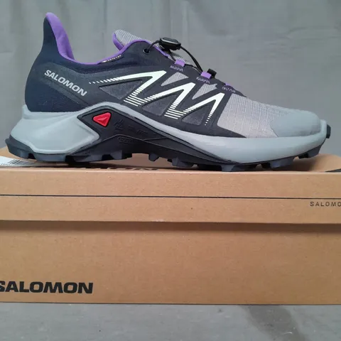 BOXED PAIR OF SALOMON SAGACROSS SHOES IN NAVY/PURPLE/SEA FOAM UK SIZE 6.5