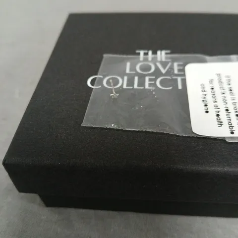 THE LOVE COLLECTION STERLING SILVER TINY STAR SHAPED NOSE STUD