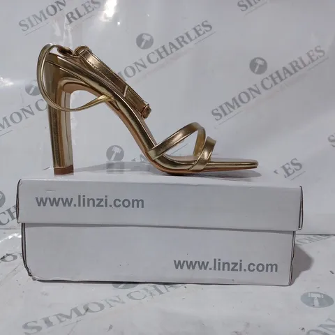 BOXED PAIR OF LINZI SWEETHEART OPEN TOE STRAPPY HEELED SANDALS IN GOLD COLOUR SIZE 5