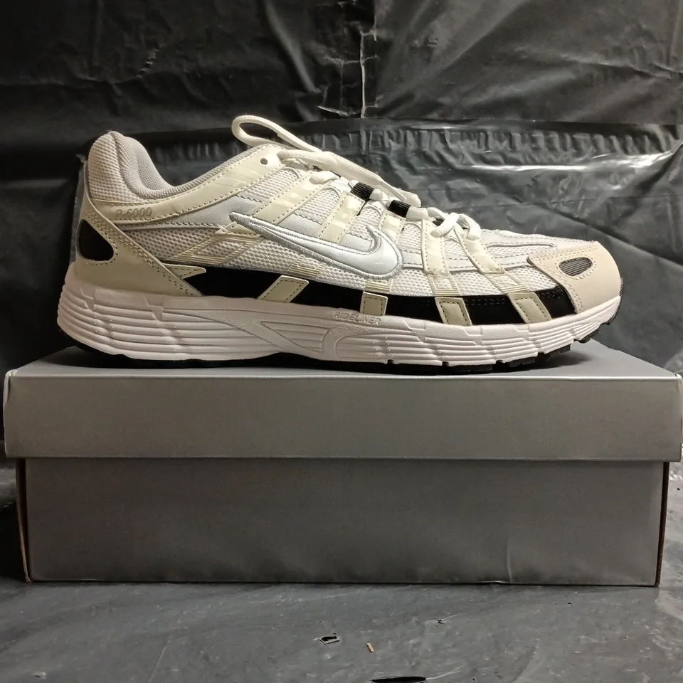 BOXED PAIR OF NIKE P-6000 TRAINERS IN WHITE/CREAM/BLACK SIZE UK 11