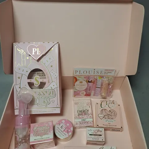 BOX OF APPROXIMATELY 8 ASSORTED PLOUISE COSMETIC PRODUCTS TO INCLUDE - WATERMELON PLUMPING MOISTURISER - THE CHEEK OF IT BAKED BRONZER - HUG IN A MUG LIP SLEEPING MASK - ETC