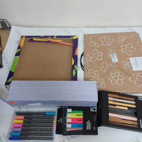 MEDIUM BOX OF ASSORTED HOUSEHOLD ITEMS TOO INCLUDE PENS , CANDLES AND BAGS