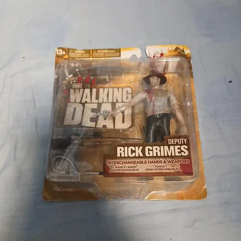 THE WALKING DEAD RICK GRIMES ACTION FIGURE – INTERCHANGEABLE HANDS & WEAPONS (BOXED)