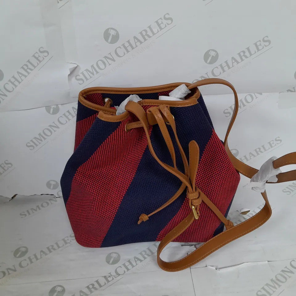 BODEN BUCKET BAG IN RED AND BLUE 