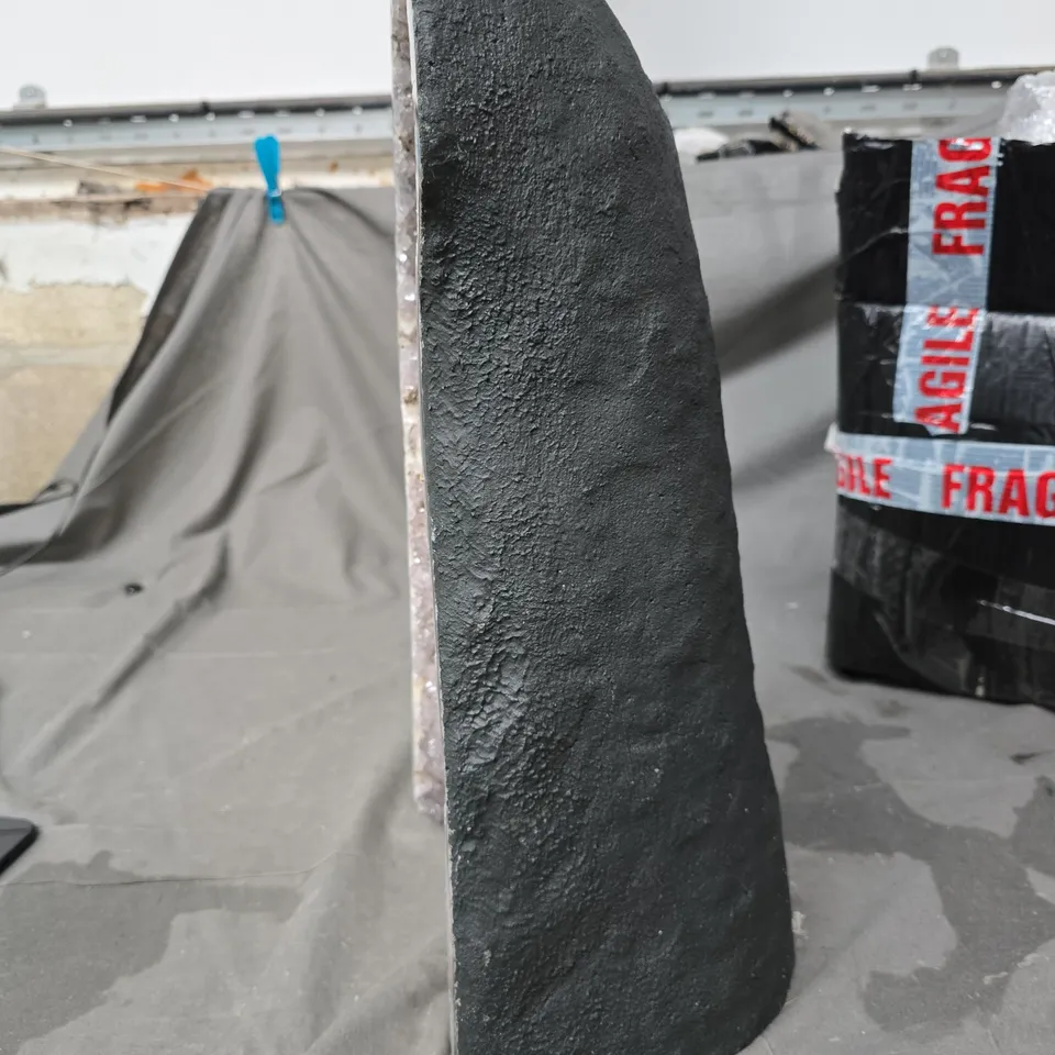 AMETHYST GEODE SLICE ON DARK ROCK BASE