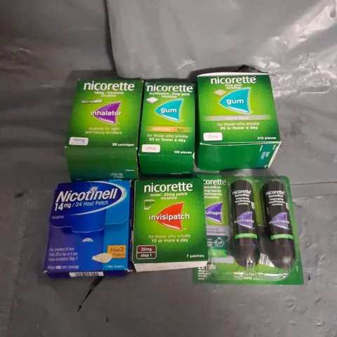 APPROXIMATELY 15 ASSORTED SMOKING PREVENTION AIDS TO INCLUDE NICORETTE GUM, NICOTINELL PATCHES, NICORETTE INHALATOR