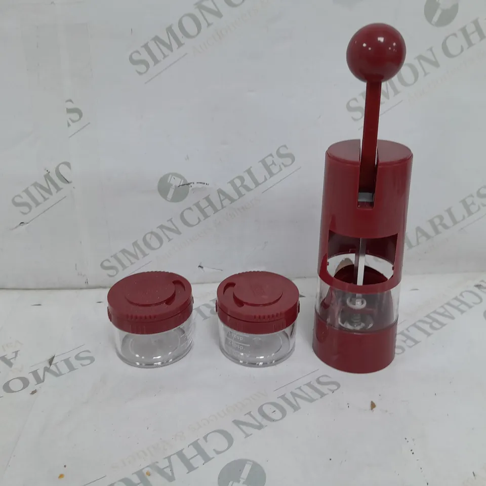 KUHN RIKON RATCHET GRINDER WITH 2 STORAGE POTS IN BRICK RED