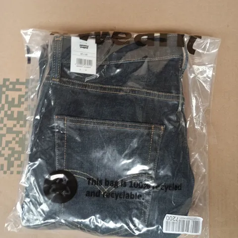 BAGGED LEVI'S JEANS IN DARK BLUE SIZE 30/30