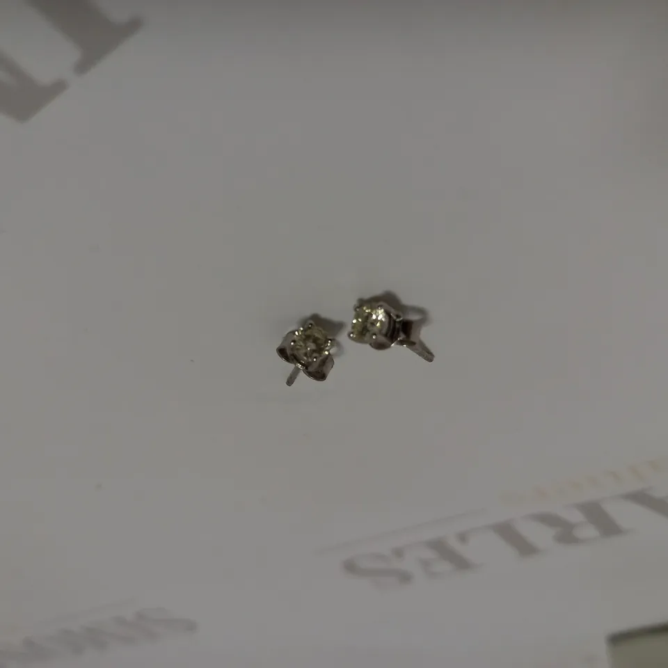 DESIGNER 18CT WHITE GOLD STUD EARRINGS SET WITH DIAMONDS WEIGHING +-0.53CT