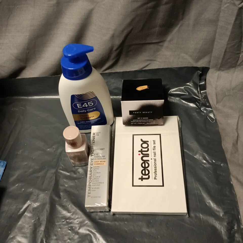 APPROXIMATELY 20 ASSORTED COSMETIC ITEMS INCLUDING FENTY BEAUTY SUPERFINE BLURRING SETTING POWDER, E45 RICH CREAM, NAIL FILE SET, TEMPORARY EYE TIGHTENER, REVOLUTION SKIN SILK F7 SERUM FOUNDATION