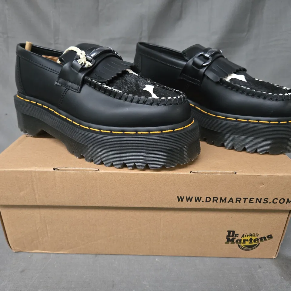 BOXED PAIR OF DR MARTENS ADRIAN SNAFFLE QUAD LOAFERS IN BLACK/COW PRINT UK SIZE 5