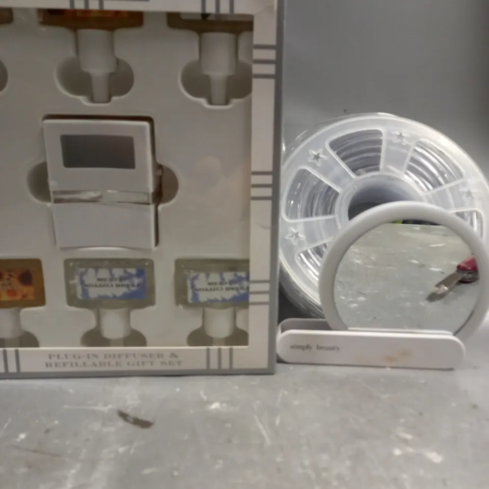 box OF APPROXIMATELY 10 ASSORTED ITEMS TO INCLUDE - home worx diffuser - led lights - simply beauty mirror ETC