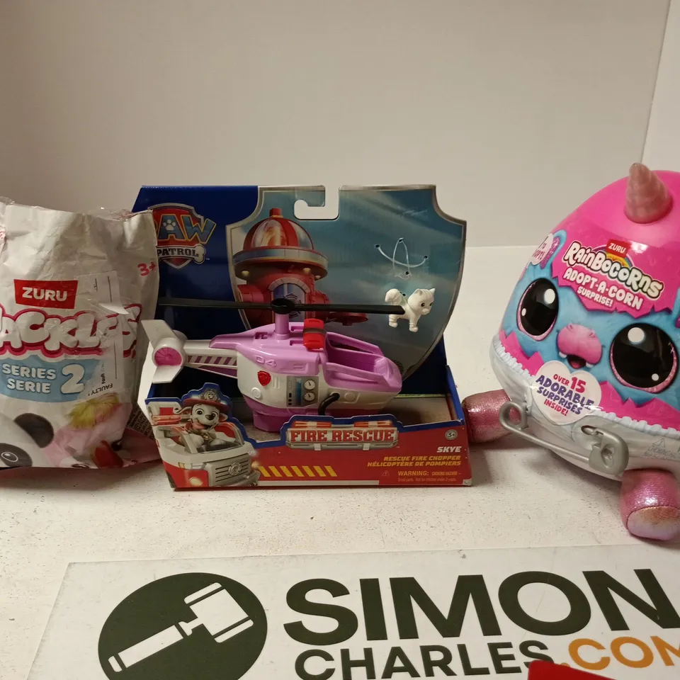 APPROXIMATELY 15 ASSORTED TOYS & GAMES PRODUCTS TO INCLUDE Zuru Stackers Series 2 bag; Paw Patrol Fire Rescue helicopter; Rainbow Corns Adopt-a-Corn egg – Toys Lot