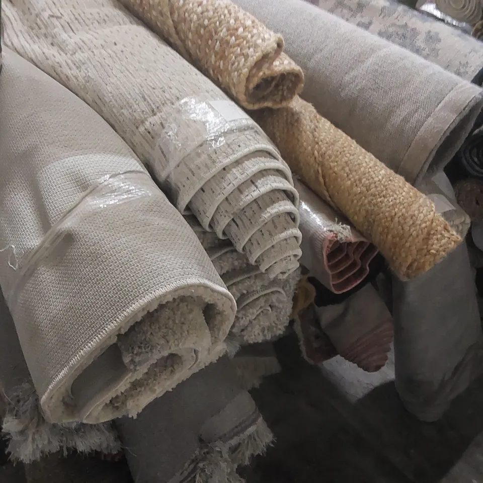 STILLAGE CONTAINING APPROXIMATELY  25x ASSORTED DESIGNER RUGS - STILLAGE NOT INCLUDED