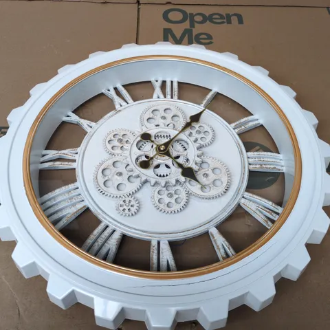 WHITE ROTATING GEAR WALL CLOCK FEATURES ROMAN NUMERALS