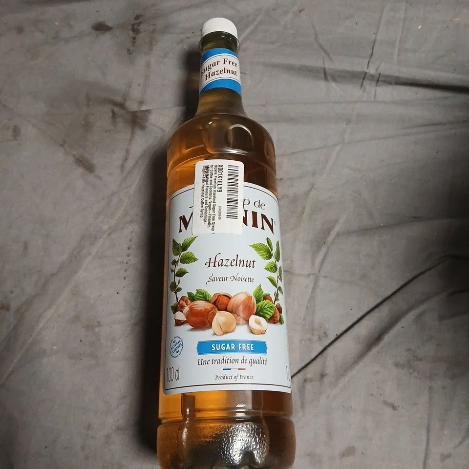 APPROXIMATELY 10 ASSORTED FOOD ITEMS INCLUDING CARAMELS OF NORMANDY , HAZELNUT SYRUP AND BARE BONES CHOCOLATE