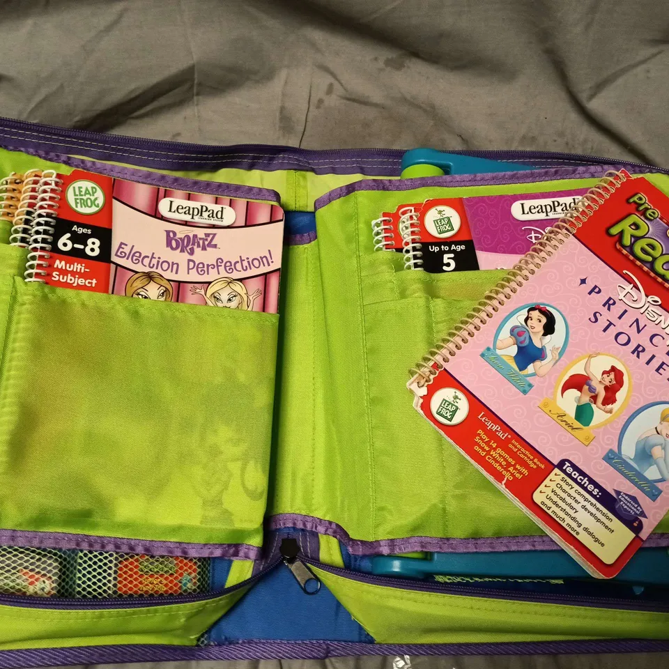 LEAP FROG LEARNING SYSTEM IN BINDER WITH BOOKS AND 12 GAMES