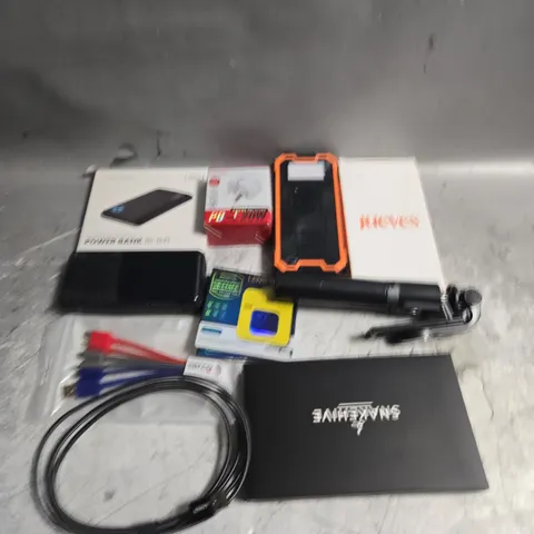 TOTE OF ASSORTED ITEMS TO INCLUDE POWERBANKS, PLUGS AND CHARGERS