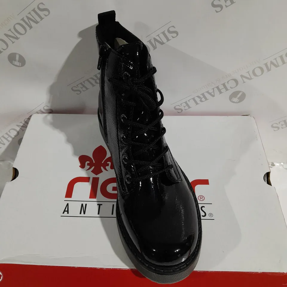 BOXED PAIR OF RIEKER LACE UP BOOTS IN BLACK - SIZE 6.5