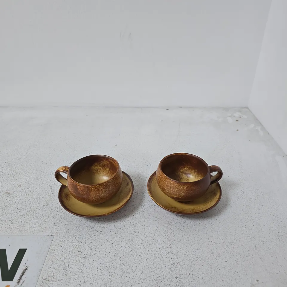 PAIR OF BROWN GLAZED CERAMIC TEACUPS WITH SAUCERS