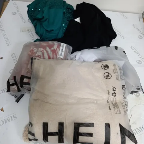 LARGE BOX OF ASSORTED CLOTHING ITEMS IN VARIOUS COLOURS AND SIZES INCLUDING TROUSERS , TOPS AND JUMPERS