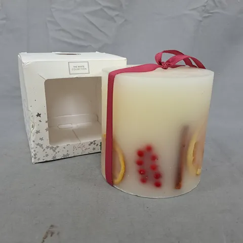 THE WHITE COLLECTION DECORATIVE PILLAR CANDLE WITH CITRUS SLICES AND CINNAMON STICKS – PINK RIBBON WRAP (BOX SHOWN)