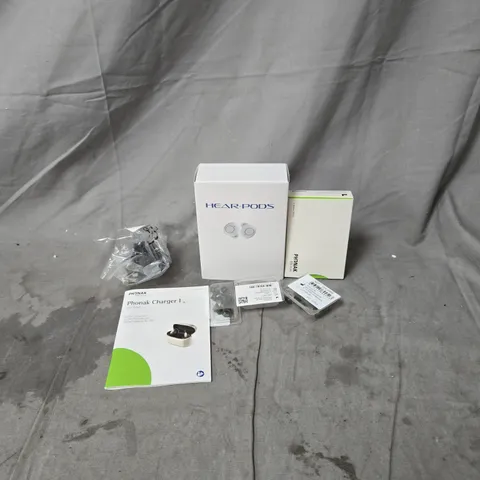 APPROXIMATELY 10 ASSORTED ITEMS OF EARPHONES AND ACCESSORIES INCLUDING HEARPODS, PHONAK AND CHARGER