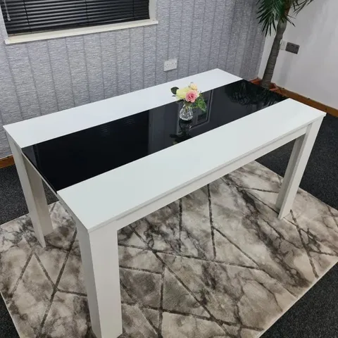BOXED RUFFNER DINING TABLE