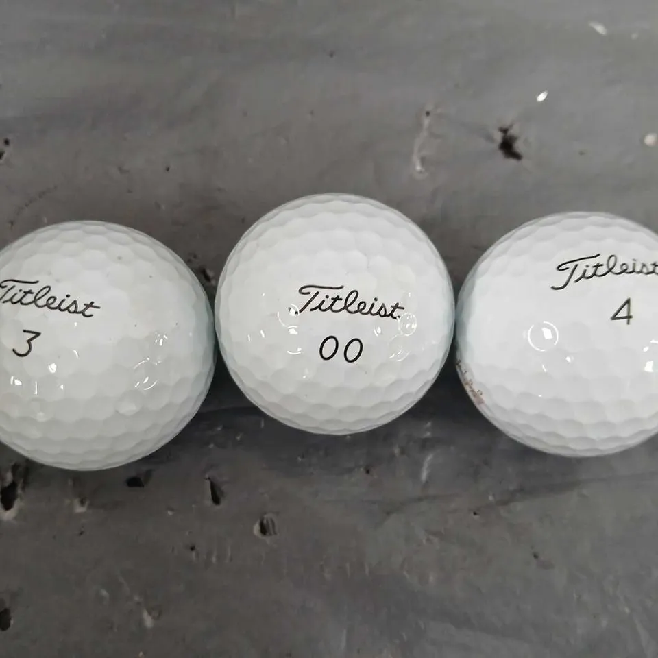 APPROXIMATELY 24 ASSORTED TITLEIST GOLFBALLS