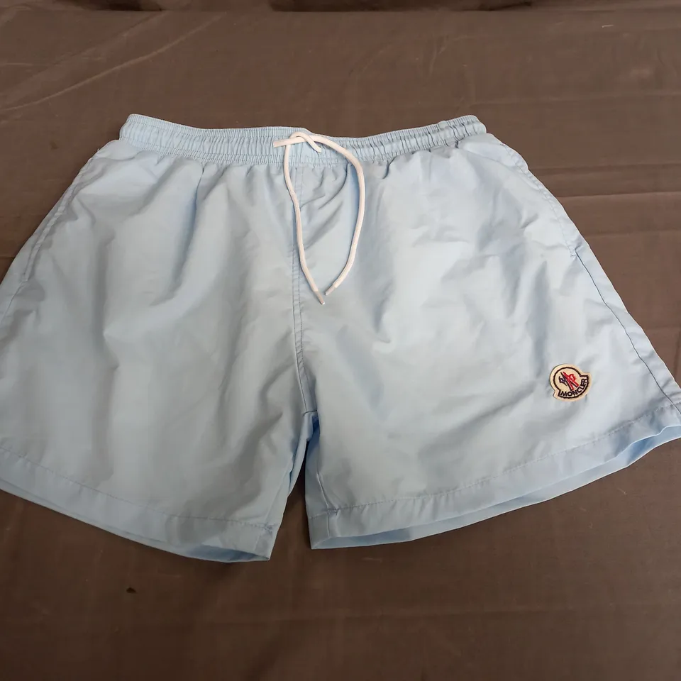 MONCLER SWIM SHORTS IN LIGHT BLUE SIZE L