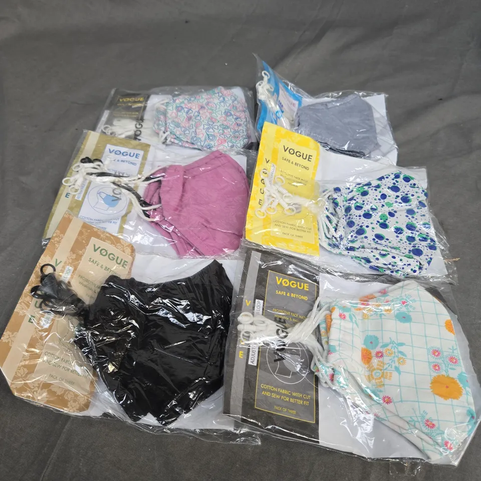 BOX OF APPROXIMATELY 50 ADJUSTABLE FABRIC FACE MASKS IN ASSORTED DESIGNS