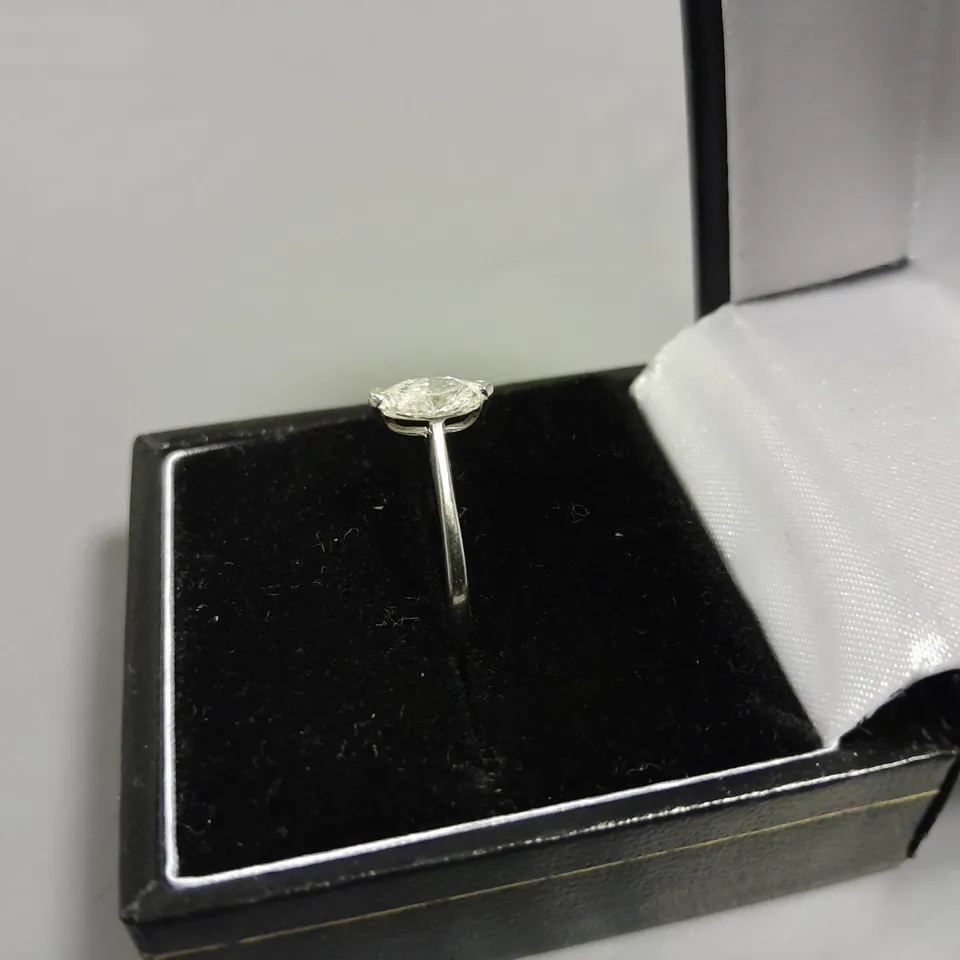 18CT GOLD SOLITAIRE RING SET WITH A MARQUISE CUT DIAMOND